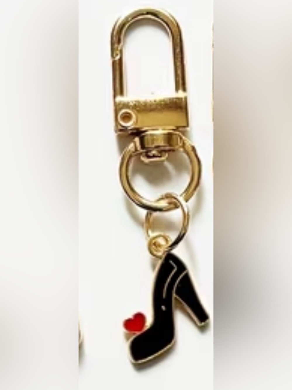 Gold Tone Keychain Shoe Charm with Black Enamel Accent and red heart.
